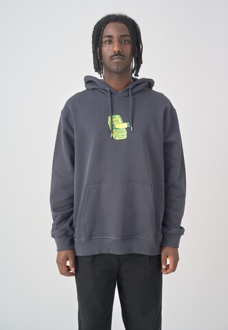 Cleptomanicx Kapuzensweatshirt 'Boxy Hooded Sardinade' in Grau: Vorderseite