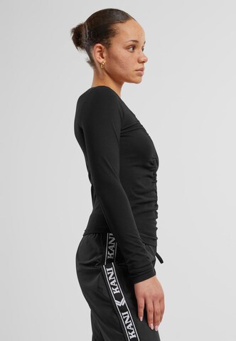 Karl Kani Shirt in Schwarz