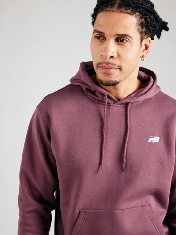 Felpa 'Sport Essentials' di new balance in rosso