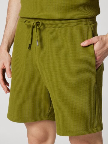 ABOUT YOU x Kevin Trapp Regular Pants 'Simon' in Green