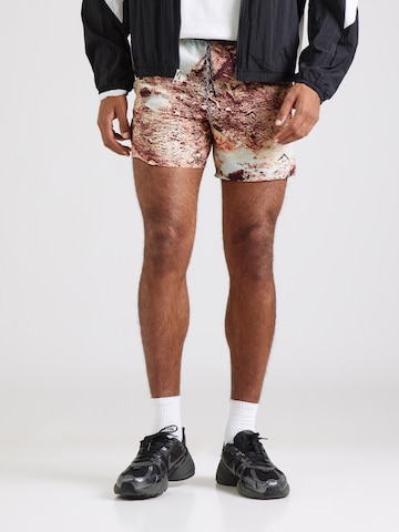Regular Pantaloni sport de la NIKE pe bej: față