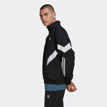 ADIDAS ORIGINALS Jacke 'Rekive' in Schwarz