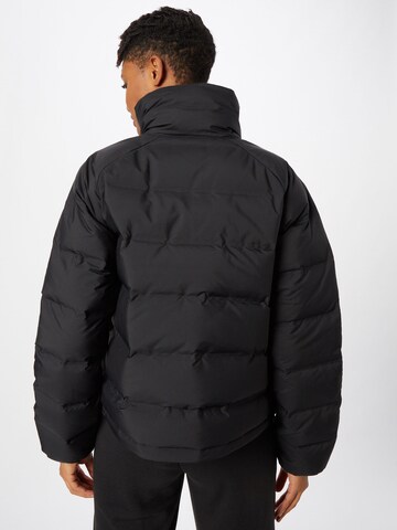 ADIDAS SPORTSWEAR - Chaqueta de montaña 'Helionic' en negro