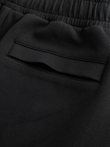 Tapered Pantaloni di Next in nero