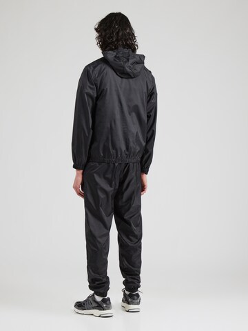 Survêtement 'Tornati' ELLESSE en noir