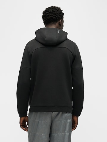Bluză cu fermoar sport 'PUMATECH' de la PUMA pe negru