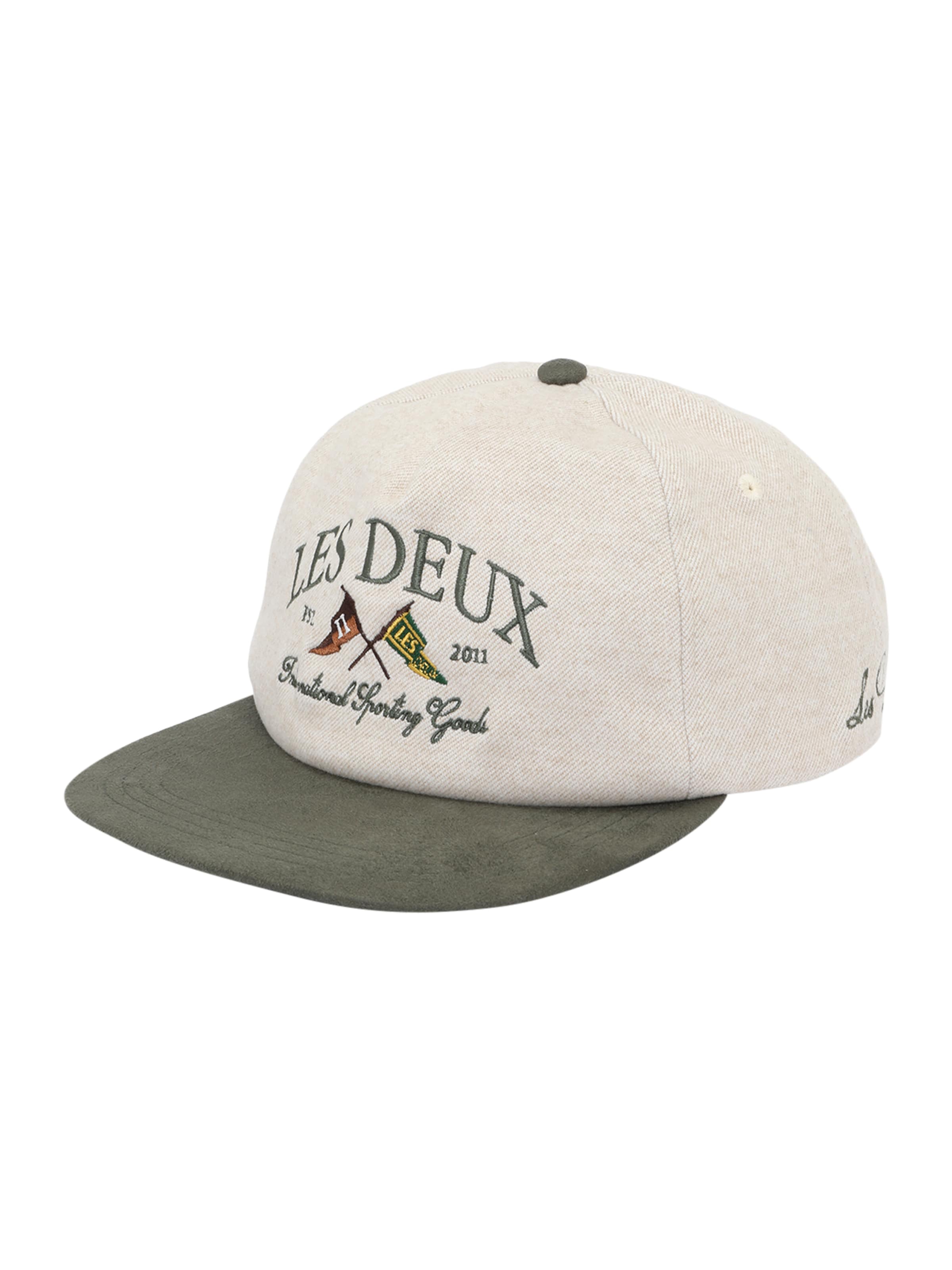 Les Deux Keps 'Ivy League' i beige: framsida