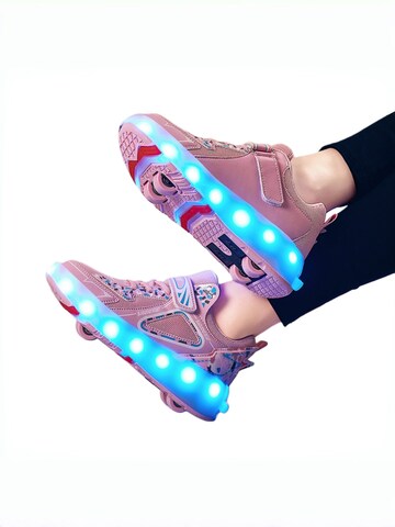 HUSKSWARE Inline and Roller Skates in Pink