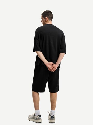 Bershka Широка кройка Панталон в черно