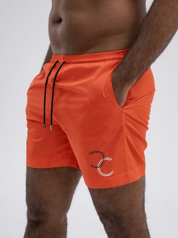 Shorts de bain HACOY en orange : devant