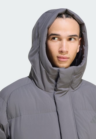 ADIDAS SPORTSWEAR - Casaco deportivo 'Helionic' em cinzento