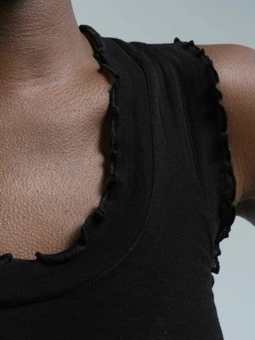 Seamless Basic Overdel 'Flounce' i sort