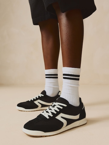 Baskets Next en noir