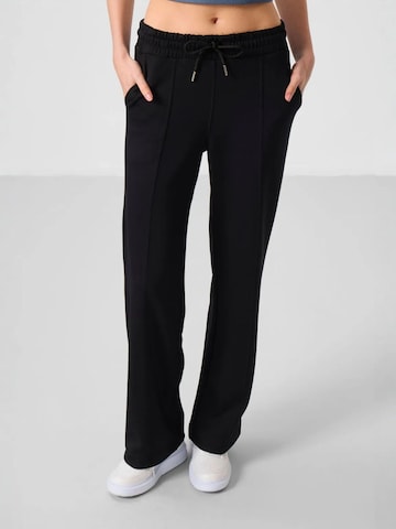Pantalon Tommy Life en noir : devant