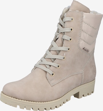 Bottines à lacets Rieker en beige : devant