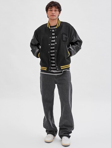 GUESS Übergangsjacke 'Batman-Patch' in Schwarz