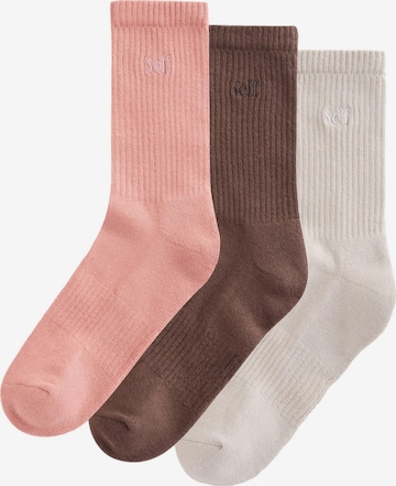 self. Socks in Beige: front