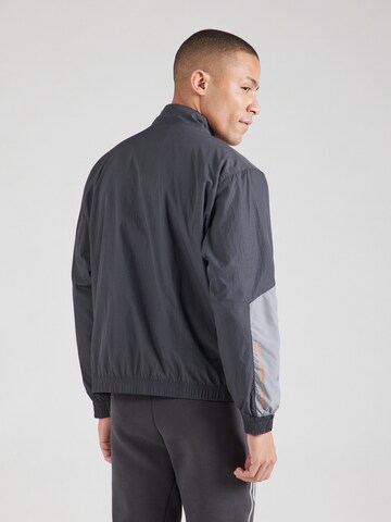 Nike Sportswear Between-season jacket 'AIR' in Grey