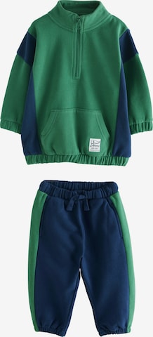 Next Juoksupuku värissä vihreä: etupuoli