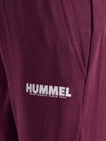 Effilé Pantalon de sport Hummel en violet