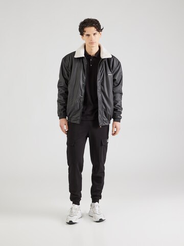 Maglietta di EA7 Emporio Armani in nero