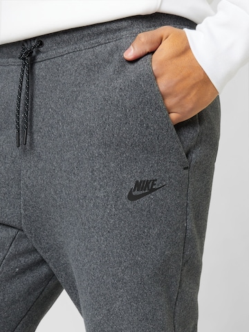 Nike Sportswear Zúžený Kalhoty – černá