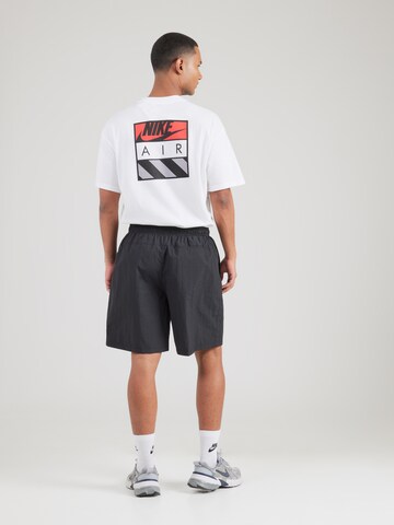 Nike Sportswear Loosefit Byxa 'CLUB' i svart