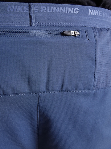Regular Pantalon de sport 'STRIDE' NIKE en bleu