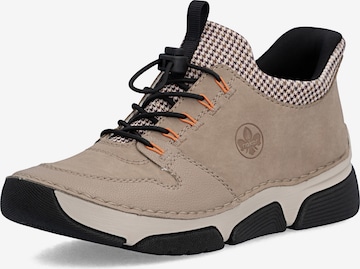 Bottines à lacets Rieker en beige : devant
