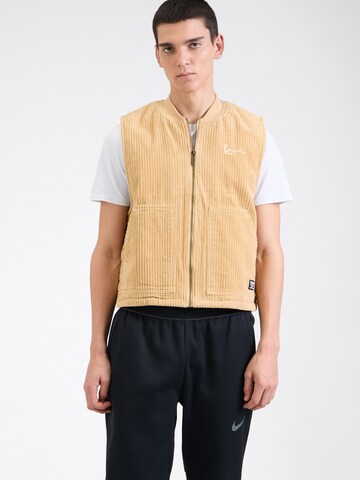 Karl Kani - Chaleco en beige: frente
