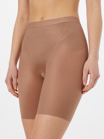 Pantaloni modellanti di SPANX in marrone: frontale