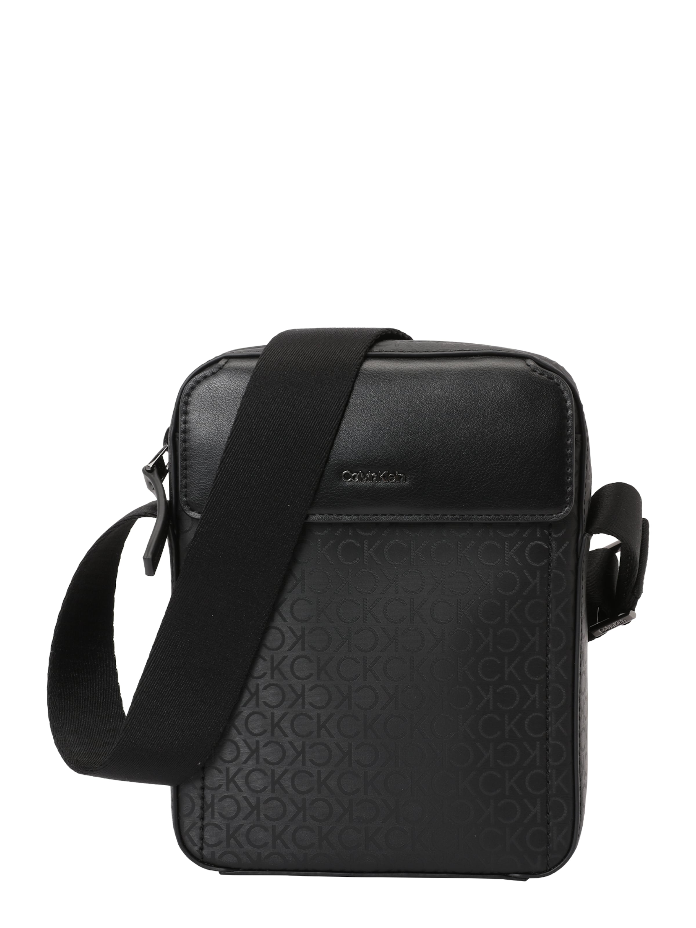 Calvin Klein Чанта за през рамо тип преметка в черно: отпред