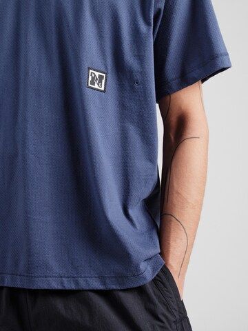 NIKE Performance shirt 'HERITAGE' in Blue