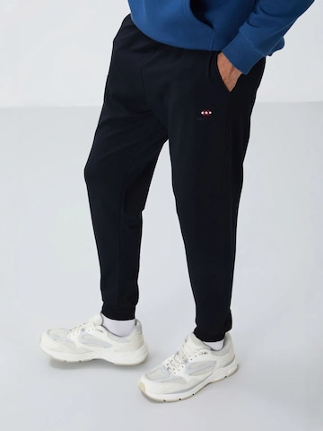 Regular Pantalon Tommy Life en noir
