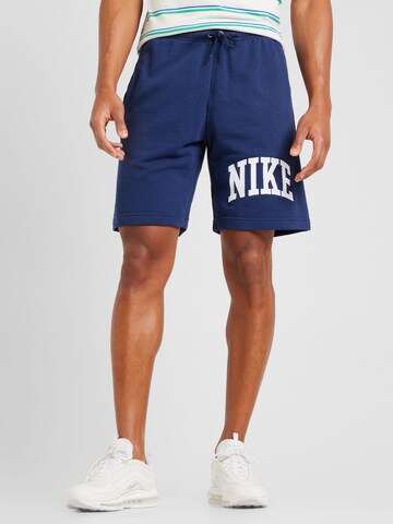 Loosefit Pantalon 'CLUB' Nike Sportswear en bleu : devant