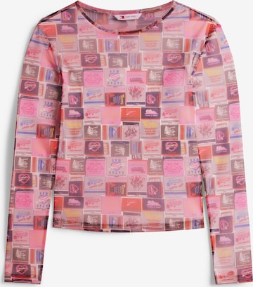 T-shirt 'AOP' Tommy Jeans en rose : devant