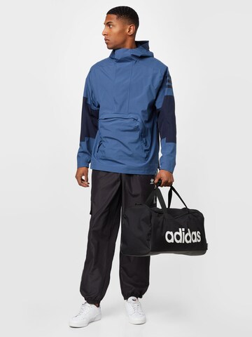 ADIDAS TERREX - Chaqueta de montaña 'Utilitas Rain.Rdy ' en azul