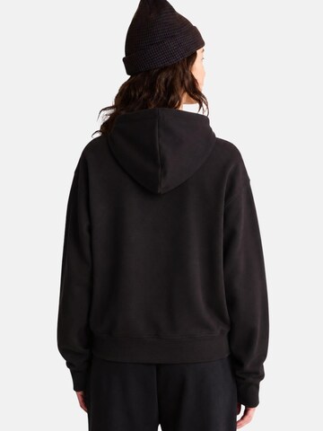 THE NORTH FACE Bluzka sportowa 'THE NORTH FACE W ESS DP REG HOODIE Maglieria' w kolorze czarny