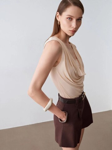 Top di Dilvin in beige