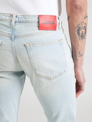 Skinny Jeans di HUGO in blu