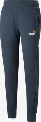 PUMA Tapered Sportbroek in Blauw: voorkant