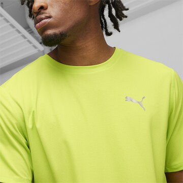 Maglia funzionale 'RUN FAVORITE VELOCITY' di PUMA in verde