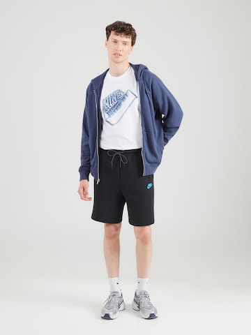 Regular Pantalon 'TCH FLC' Nike Sportswear en noir