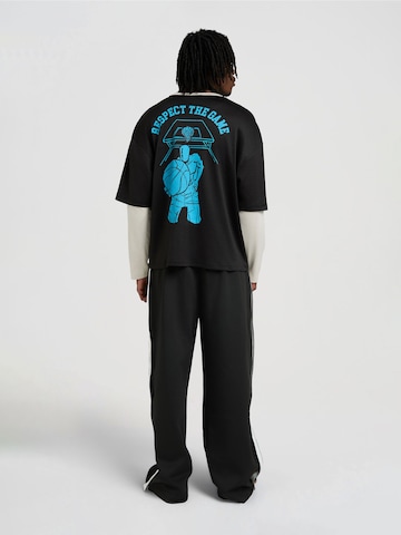 Tricou de la AND1 pe negru