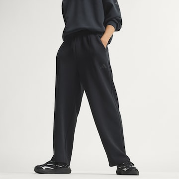ADIDAS SPORTSWEAR - Loosefit Calças de desporto em preto