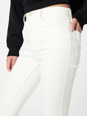 Coupe slim Jean River Island en blanc