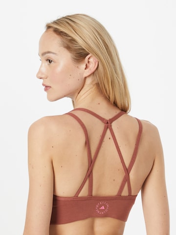 Bustier Soutien-gorge de sport 'Truestrength Medium-Support' ADIDAS BY STELLA MCCARTNEY en rouge