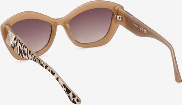 Ochelari de soare de la GUESS pe bej