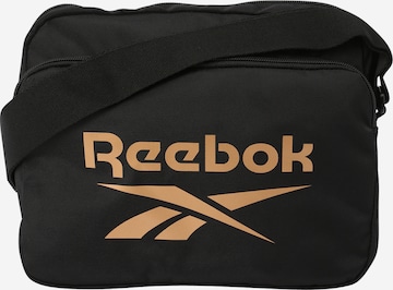 Reebok - Bolsa de deporte en oro: frente