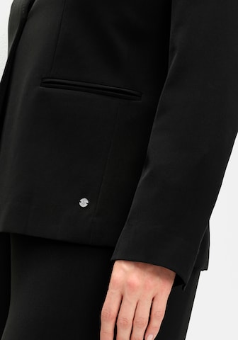 Sacou de la SHEEGO pe negru